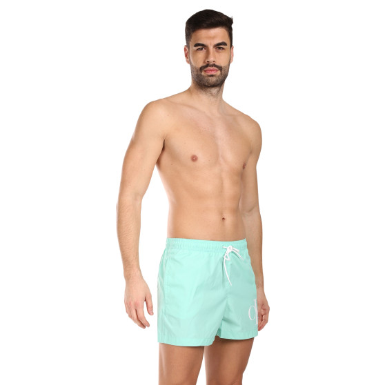 Ανδρικά μαγιό Calvin Klein πράσινο (KM0KM00967-LB9)