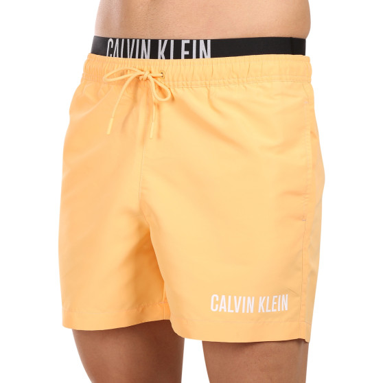 Ανδρικά μαγιό Calvin Klein πορτοκαλί (KM0KM00992-SAN)